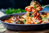 Cheesy Baked Meatballs with Marinara and Mozzarella Melt