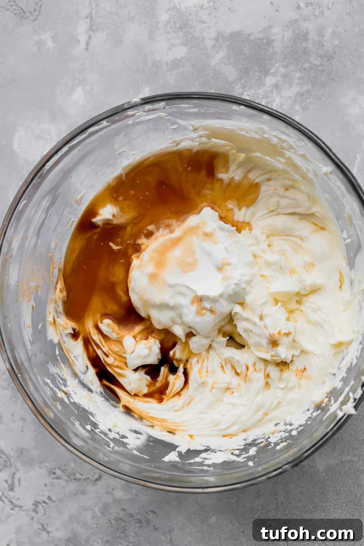 Decadent Honey Cheesecake Recipe with Silky Cream Filling 6 Honey and wet ingredients on top of cream cheese mixture.