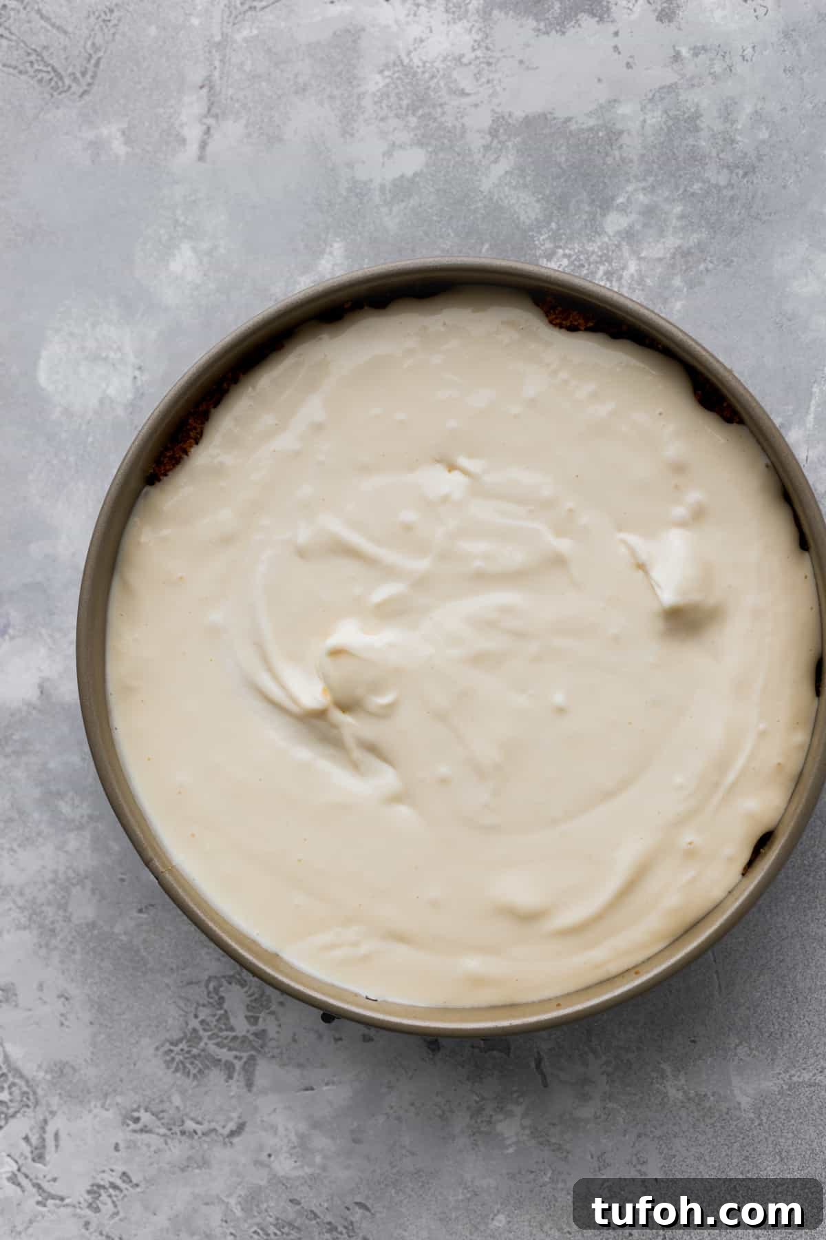 Decadent Honey Cheesecake Recipe with Silky Cream Filling 8 Cheesecake batter in a springform pan.