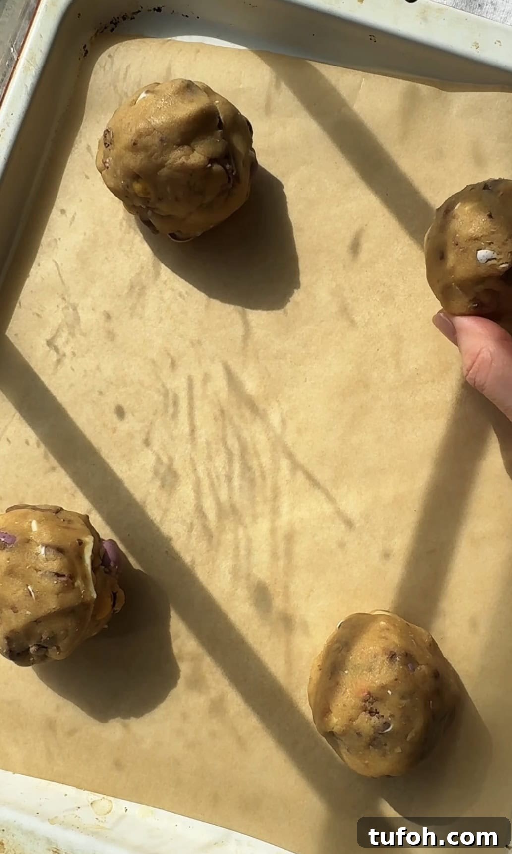 rolling balls of dough.