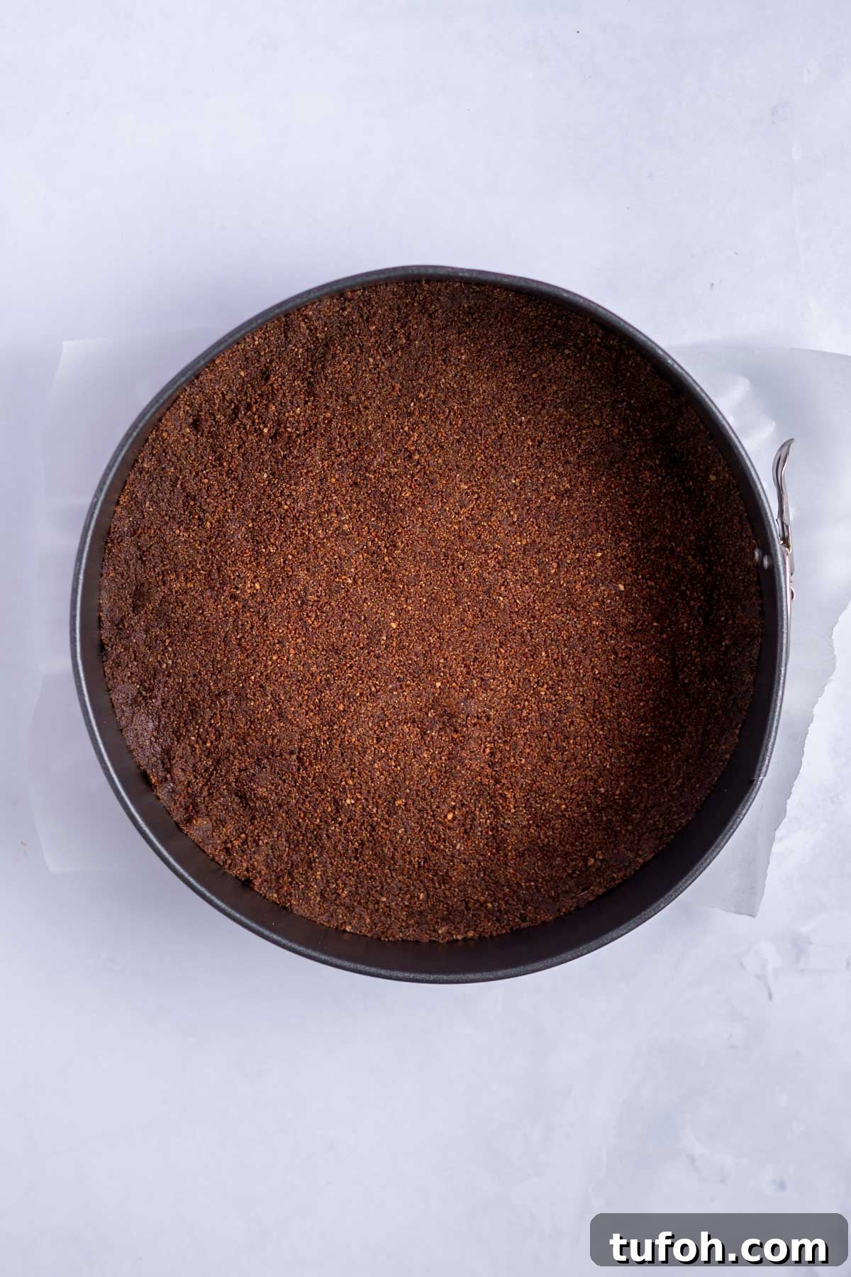 chocolate graham cracker crust pressed in the bottom of a springform pan.