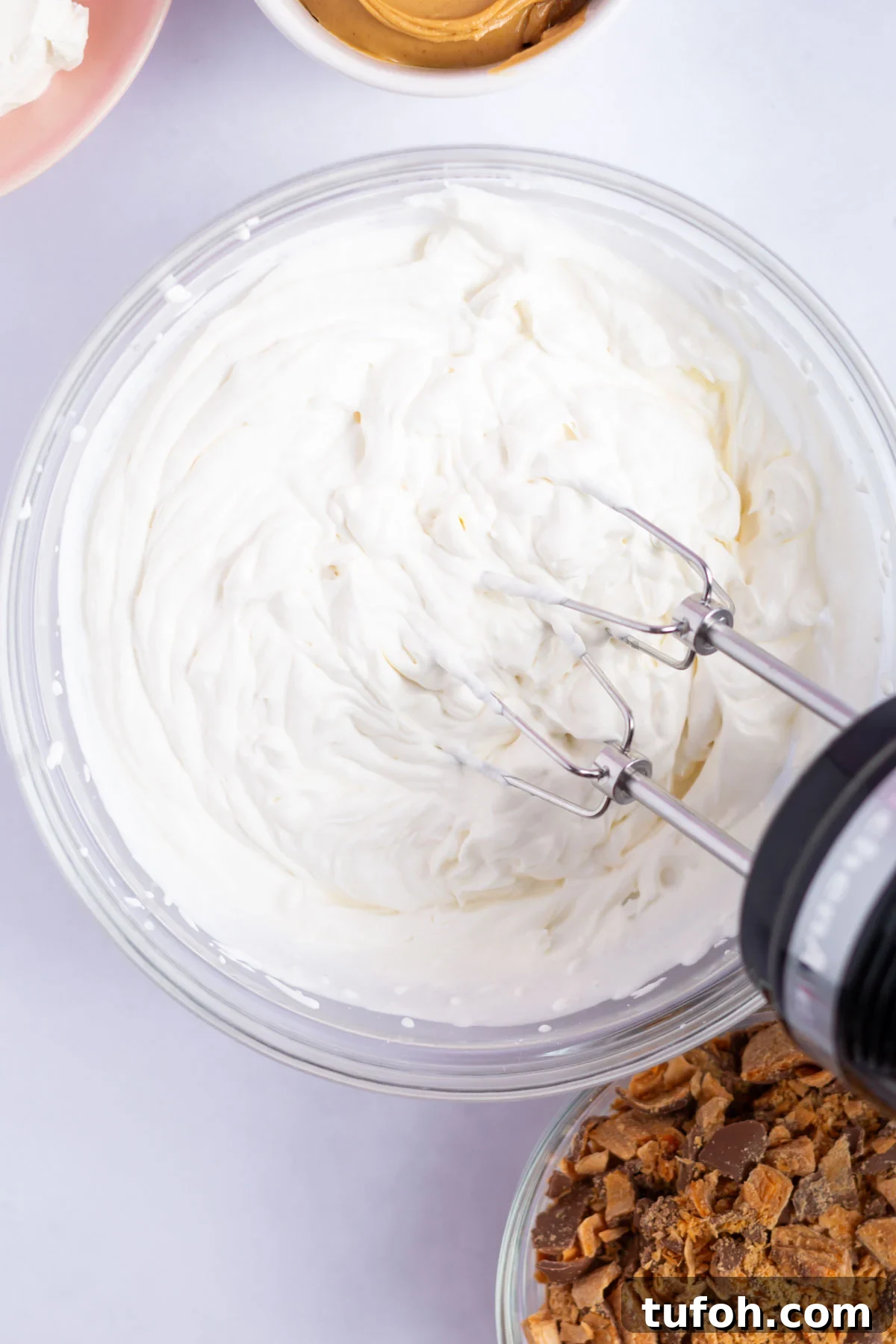 whipped cream in a mixing bowl