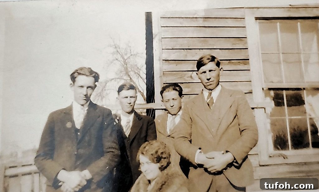 Preserve Family Photos and Protect Your Family History 5 Old family photos of 4 men and one female, all Haley cousins standing in front of wood sided house. Photo is sepia toned.