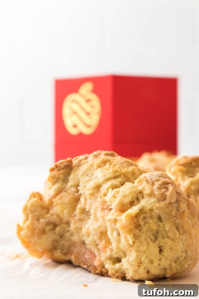 Flaky Apple Drop Biscuits Recipe for Autumn Baking 2 apple biscuits with apples in the back