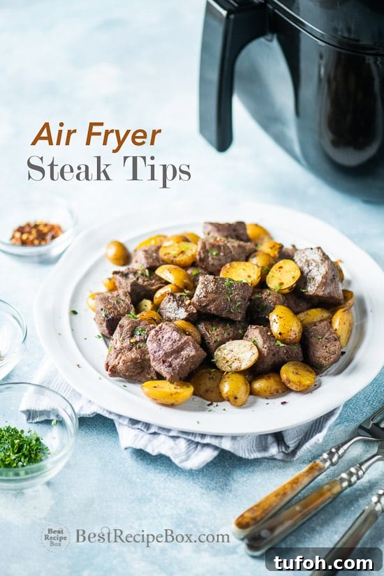 Steak tips with potatoes on a plate