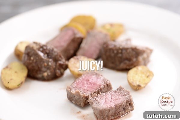 Finished steak and potatoes on a plate