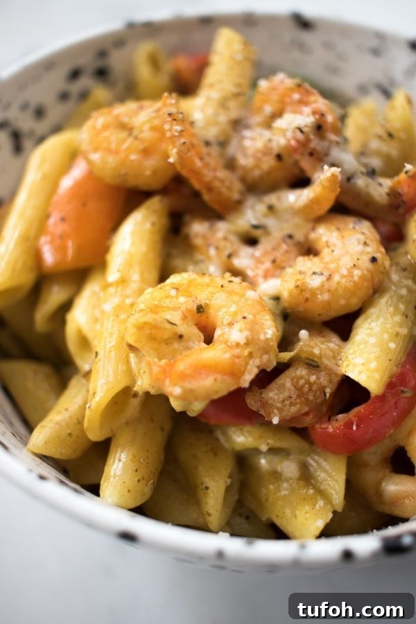 Spicy Jerk Shrimp Rasta Pasta Recipe | Caribbean-Inspired Shrimp Pasta 4 a creamy bowl of Jerk shrimp pasta
