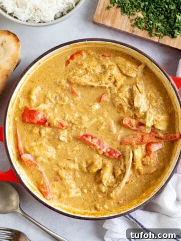 Leftover chicken curry in a pan.