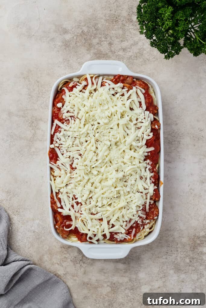 Ultimate Cheesy Baked Spaghetti Casserole Recipe 9 A layered, unbaked spaghetti casserole.