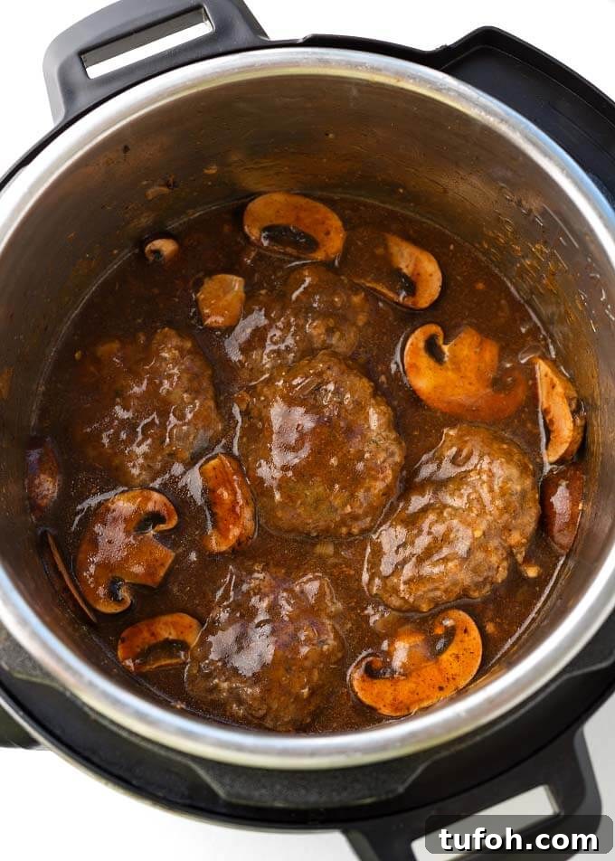 Top view of Salisbury Steaks in pressure cooker