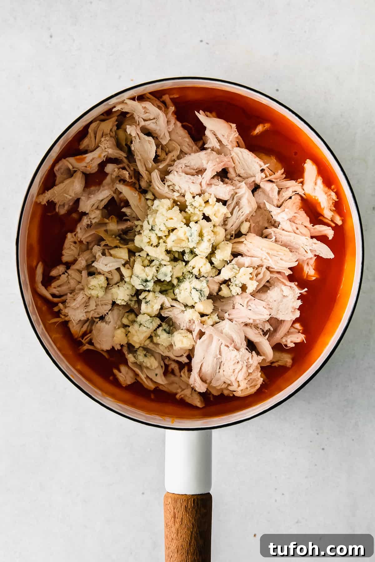 Buffalo chicken in pot.