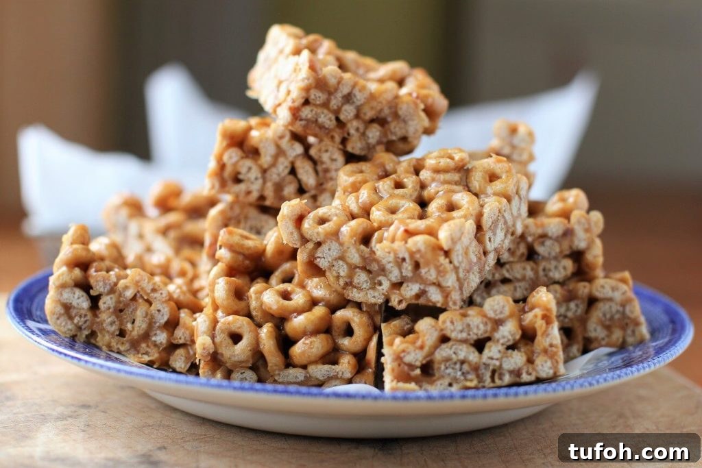 No-Bake 3-Ingredient Cereal Bars with Peanut Butter & Honey 11 plate of no bake cereal bars - so easy to whip up