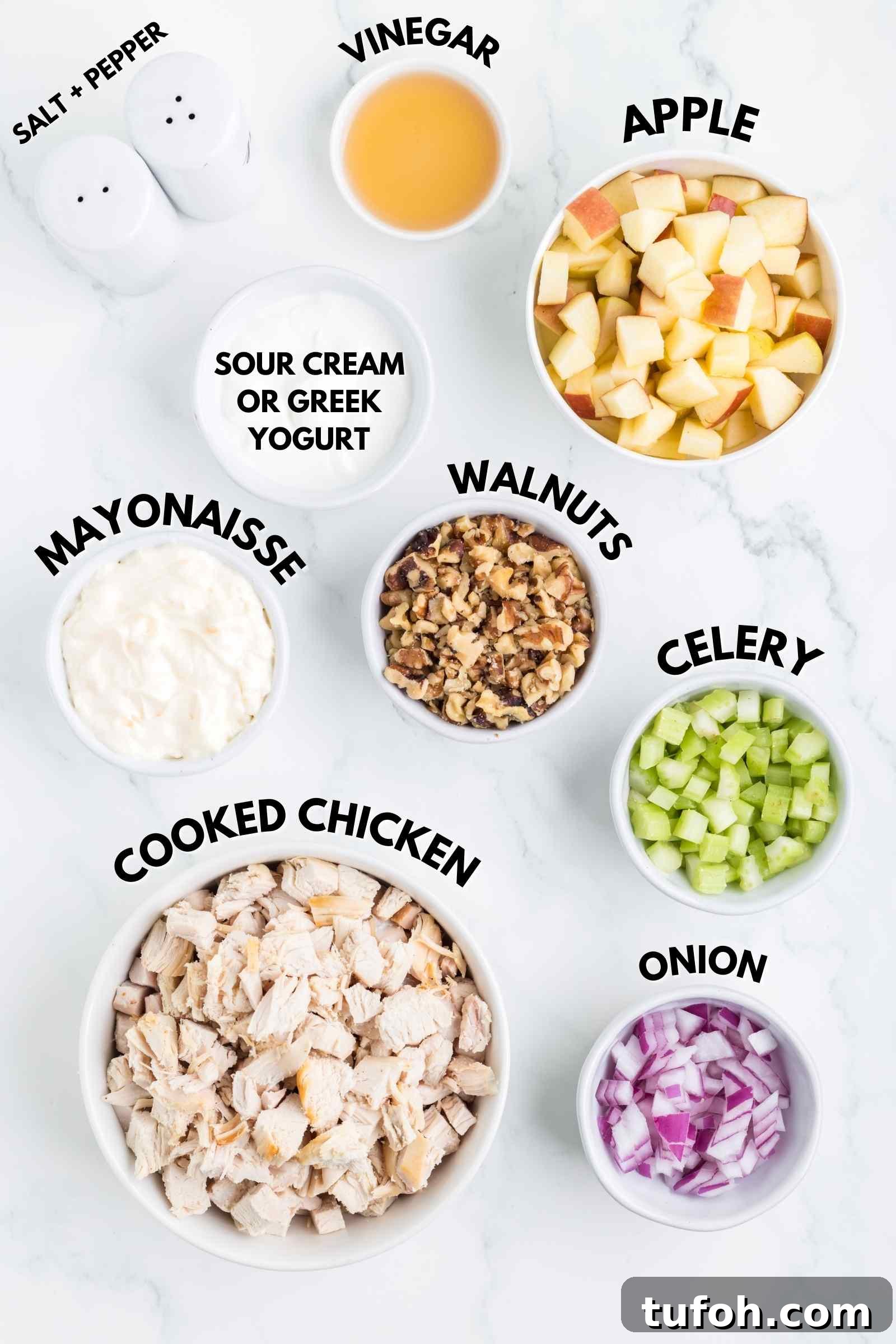 ingredients shown to make an apple walnut chicken salad