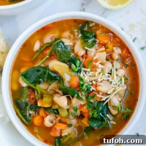Tuscan white bean soup in a bowl.
