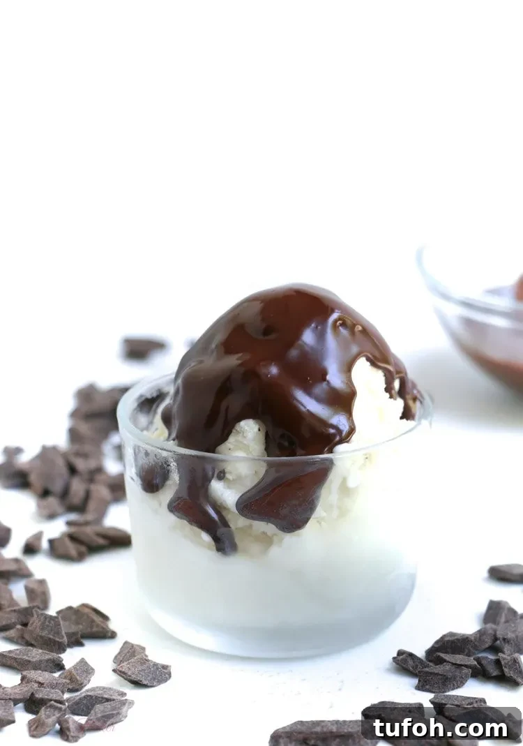 Chocolate Shell Ice Cream Topping: Crunchy Hard Chocolate Coating 5 Chocolate Hardshell Ice Cream Topping hardened on a bowl of vanilla ice cream from themerchantbaker.com
