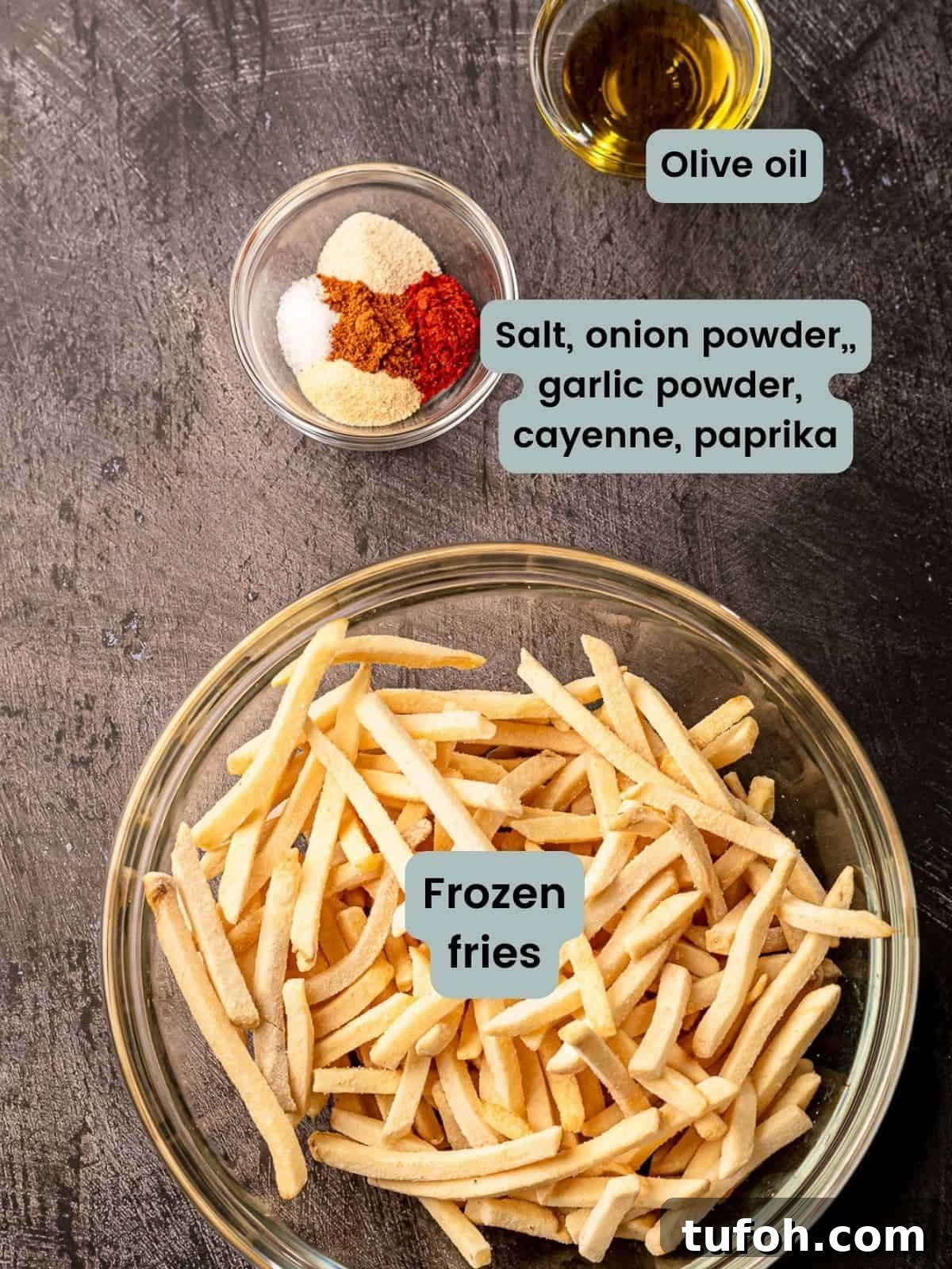 Ingredients labeled and laid out on a black surface.