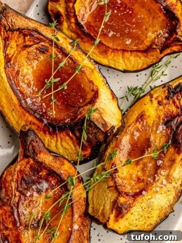 Acorn squash topped with fresh thyme.