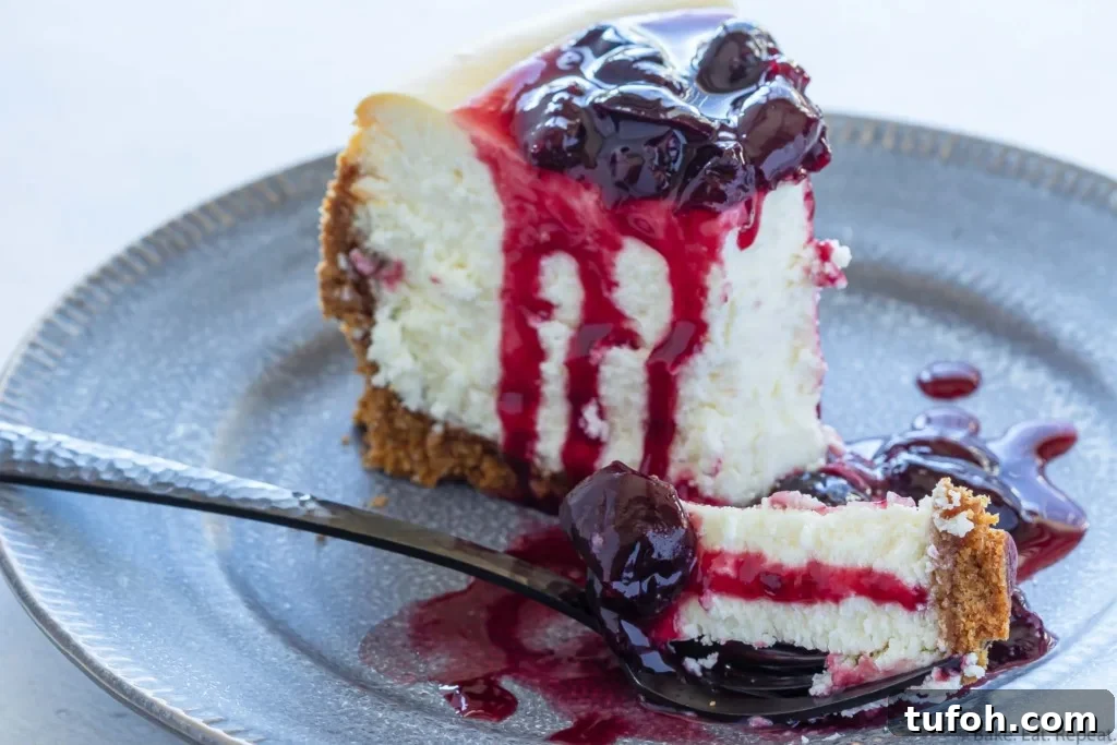 Ultimate Cherry Cheesecake Recipe with Silky Cream Cheese Filling 7 homemade cheesecake with fresh cherry sauce