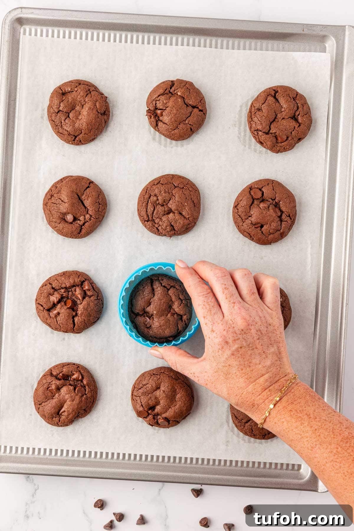 smoothing the edges out on the cookies