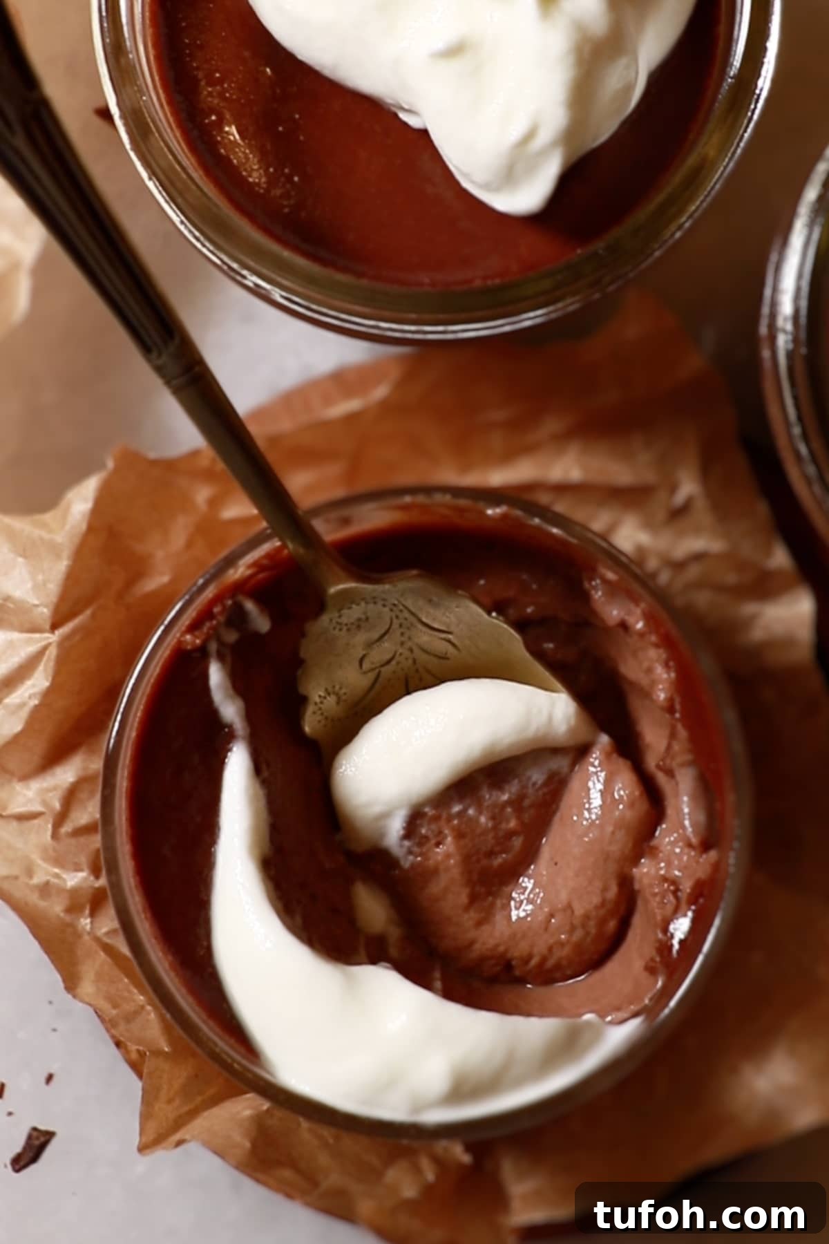 Decadent Baked Chocolate Pudding Recipe for Chocolate Lovers 3 a homemade chocolate pudding in glass cup with whipped cream