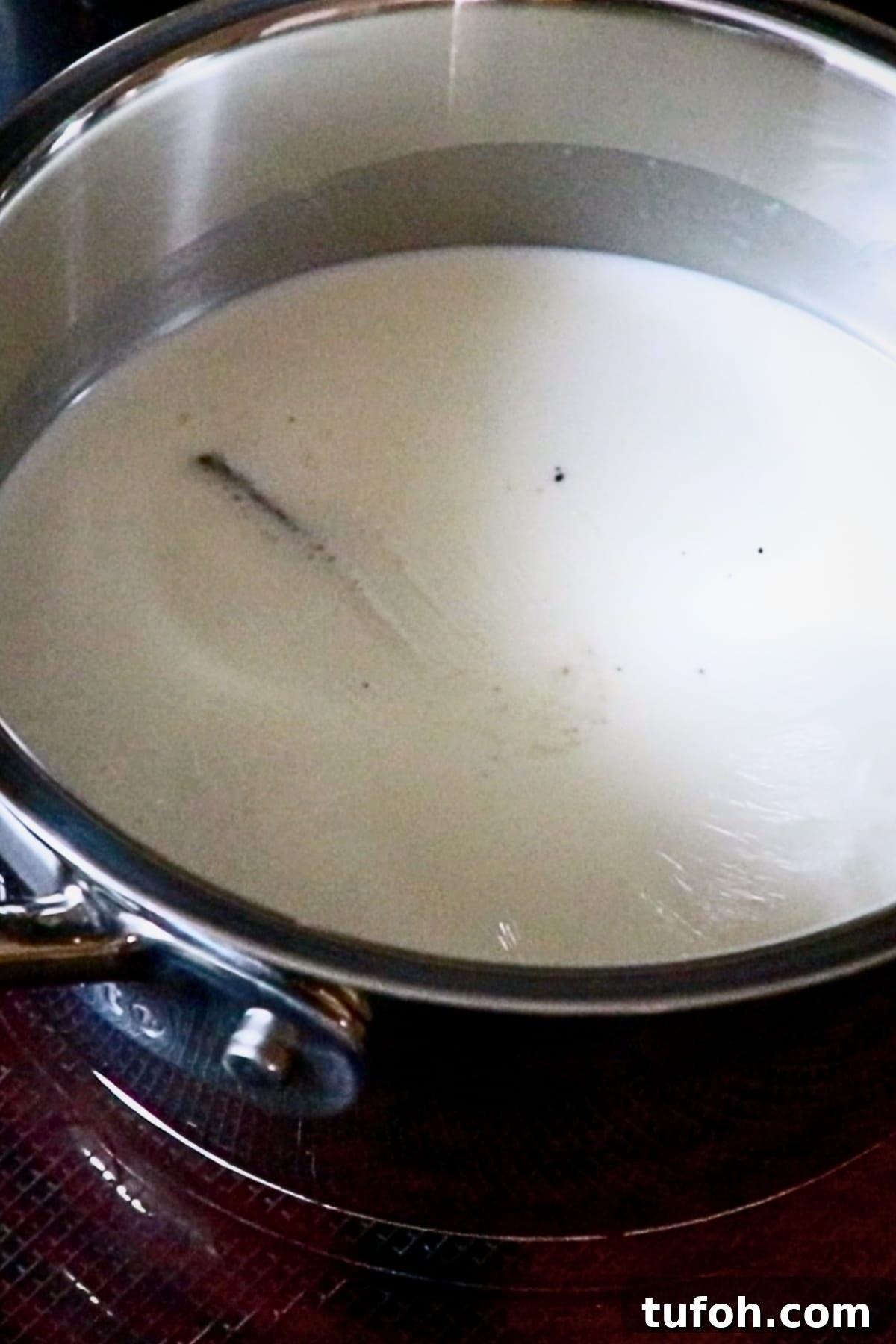 Decadent Baked Chocolate Pudding Recipe for Chocolate Lovers 7 milk, heavy cream, and vanilla beans in a saucepan