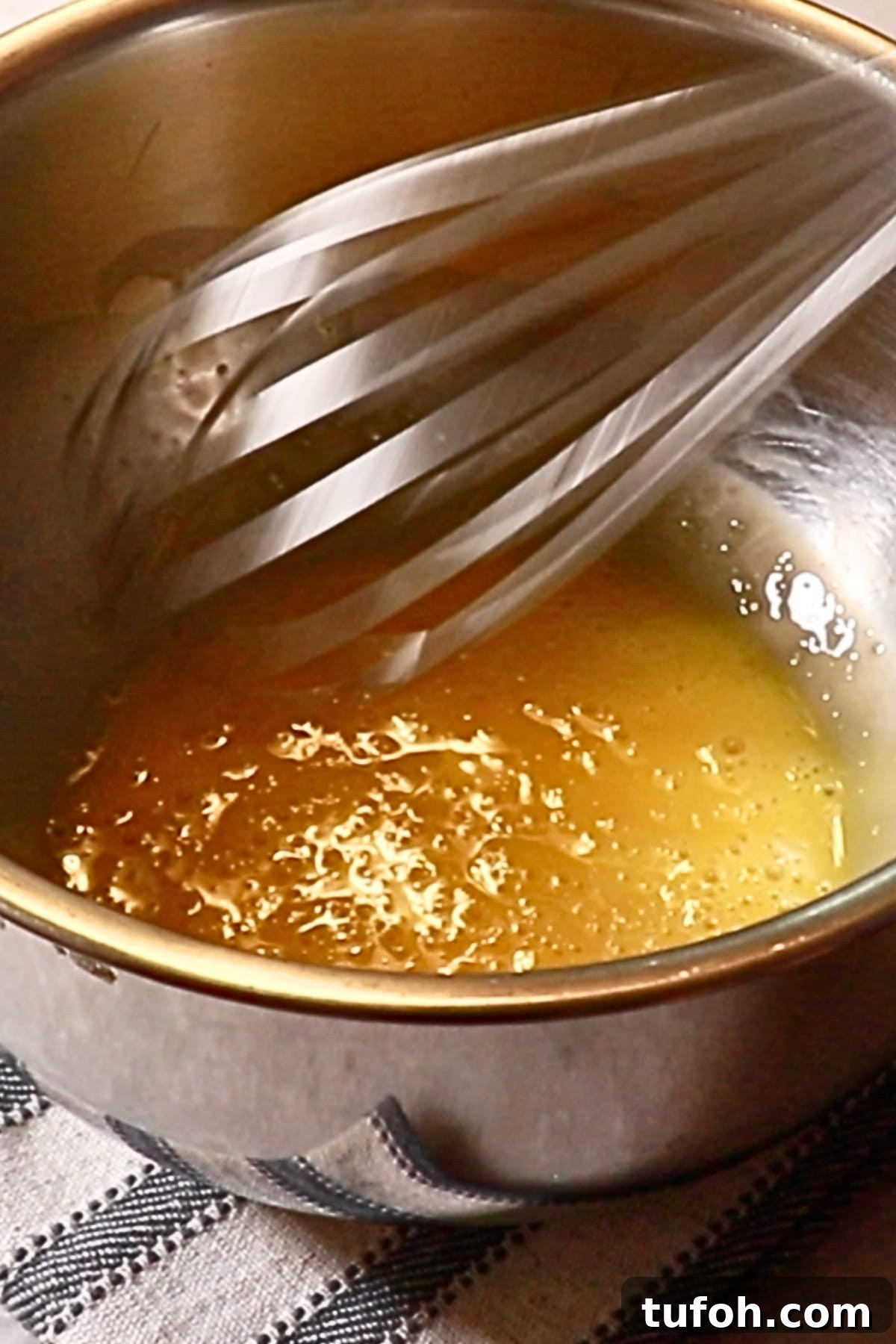 Decadent Baked Chocolate Pudding Recipe for Chocolate Lovers 8 whisking eggs in a bowl