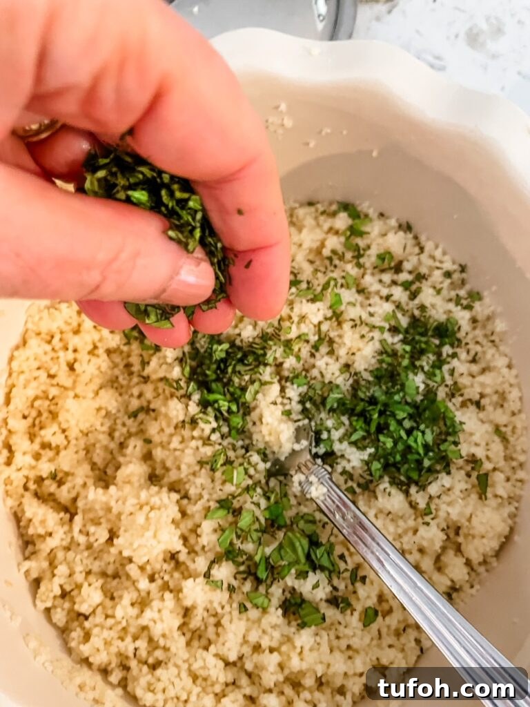 Pomegranate Mint Couscous Salad with Citrus Dressing 5 Adding in fresh chopped mint to the couscous