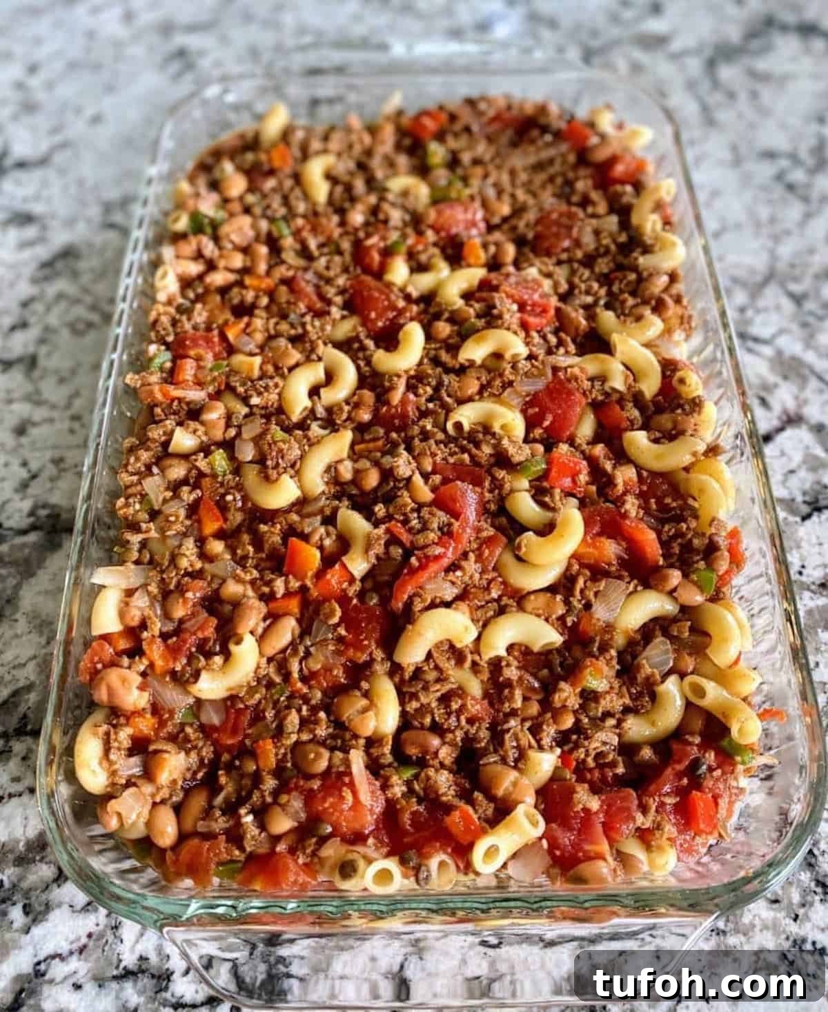 Spread the casserole filling into a 9 X 13 inch Pyrex pan on the counter. 