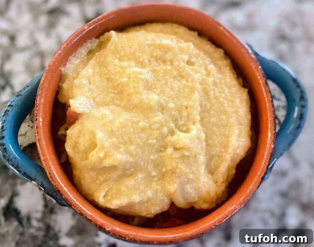 A single serving of vegan southern bake recipe ina ramekin on the table. 