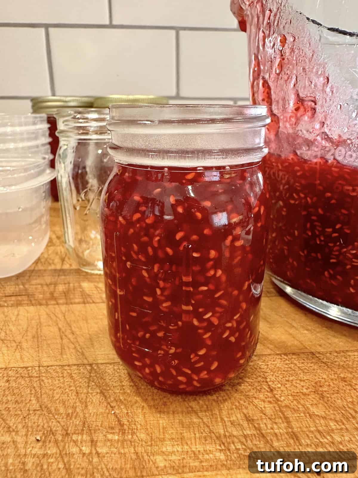 No-Cook Raspberry Jam Without Pectin or Canning 10 Easy, small batch raspberry freezer jam in jars.