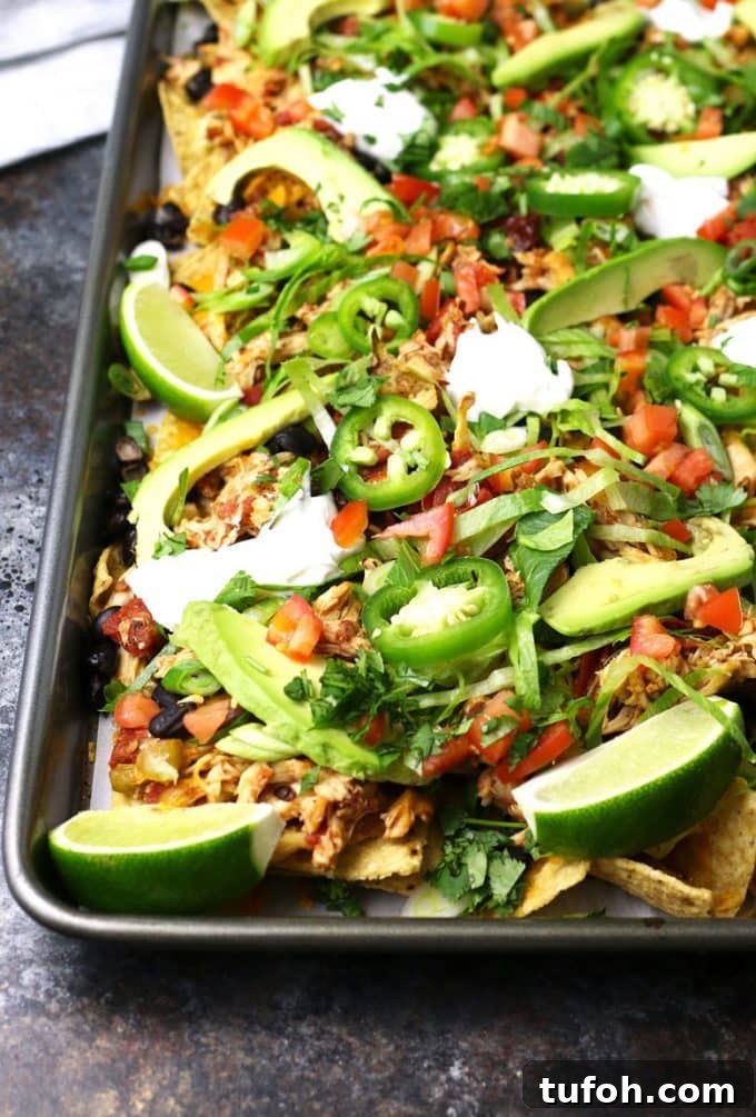 Sheet Pan Chicken Nachos with Loaded Toppings 2 Loaded chicken nachos photo