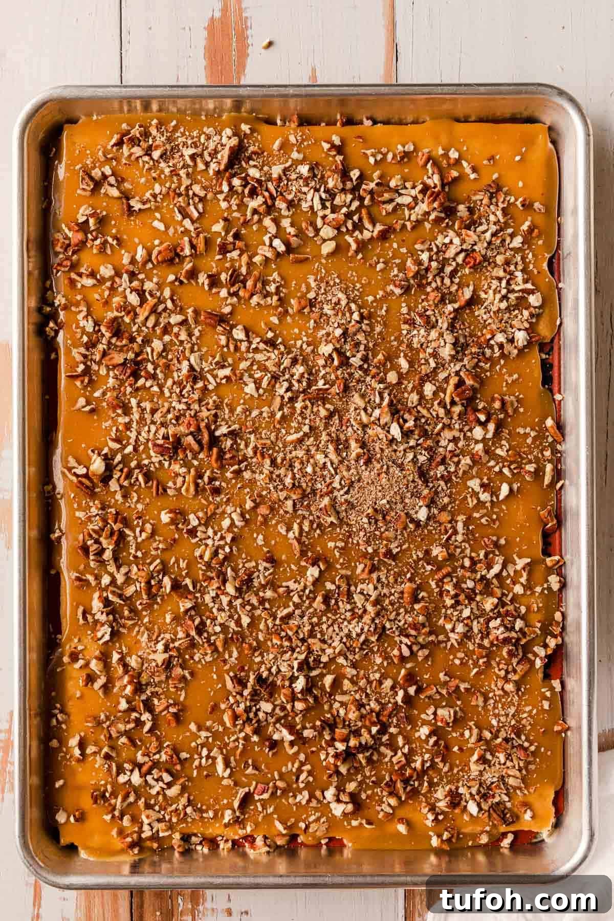 Graham Cracker Praline Recipe — Crunchy Caramel Candy Tutorial 9 The chopped pecans sprinkled over the sauce.