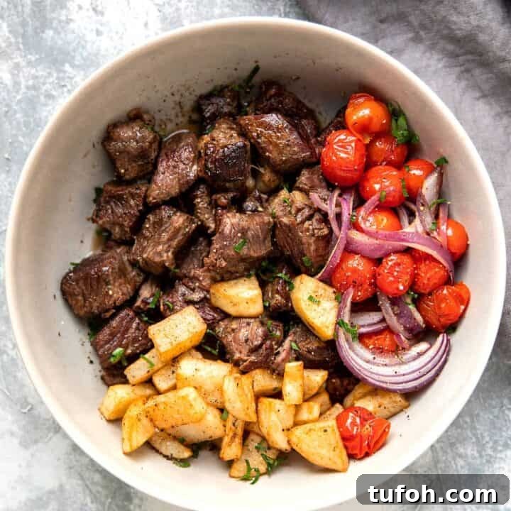 slow cooker steak bites with butter lemon sauce tomato and crispy potatoes