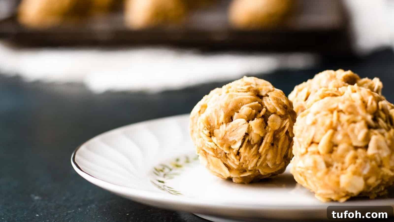 21 Kid-Friendly Treats to Make Together (Simple Recipes) 16 Overhead view of a baking sheet of peanut butter oatmeal balls.