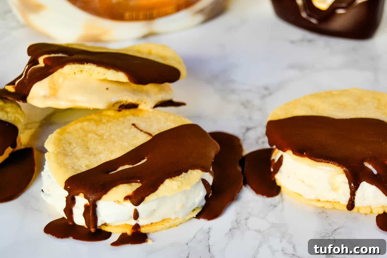 21 Kid-Friendly Treats to Make Together (Simple Recipes) 6 Ice cream sandwiches with chocolate drizzle.
