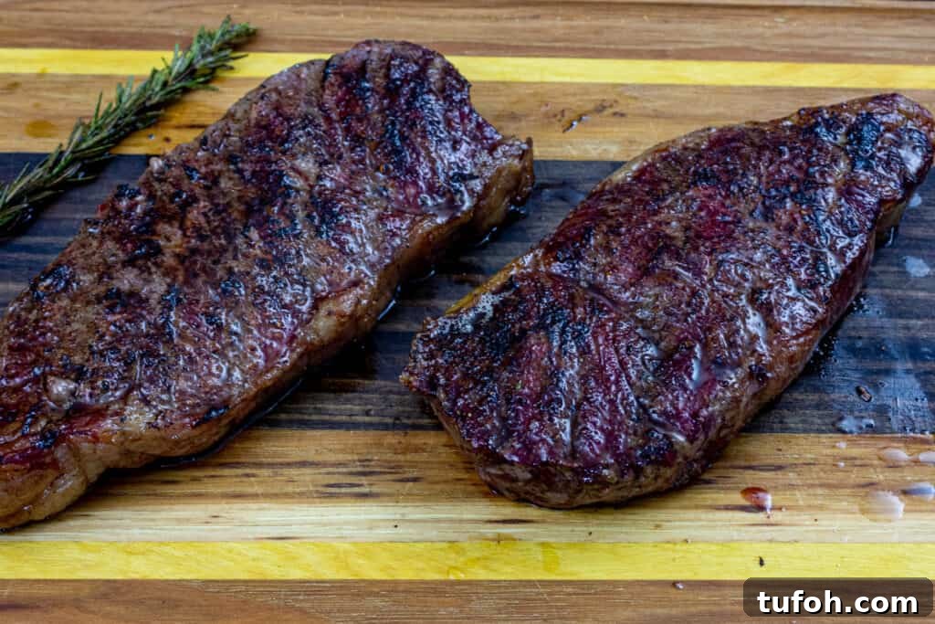 Smoked New York Strip Steak: Step-by-Step Smoking Guide 4 smoked new york strip steak on a cutting board