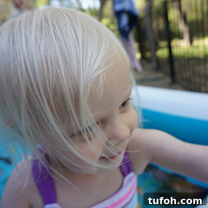Introducing Your Baby to the Pool: 5 Essential Tips for Safety and Fun 4 what to do to teach a baby to swim sq