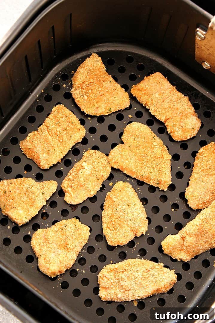 Air Fryer Chicken Nuggets Recipe - healthier option for a kid-friendly dinner! Easy homemade chicken nuggets, breaded and baked in an air fryer. Air Fryer Chicken Nuggets Recipe - healthier option for a kid-friendly dinner! Easy homemade chicken nuggets, breaded and baked in an air fryer.