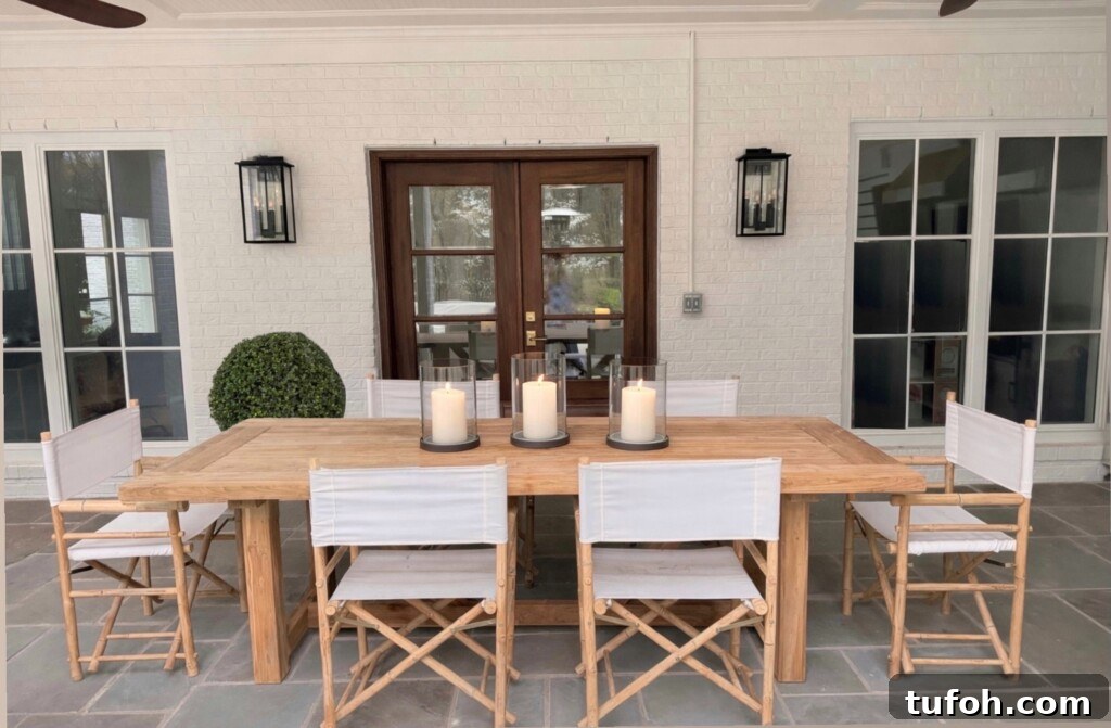 10 Clear Signs Spring Has Arrived and What They Mean 2 Six Yohana folding director chairs around a teak dining table on a covered patio