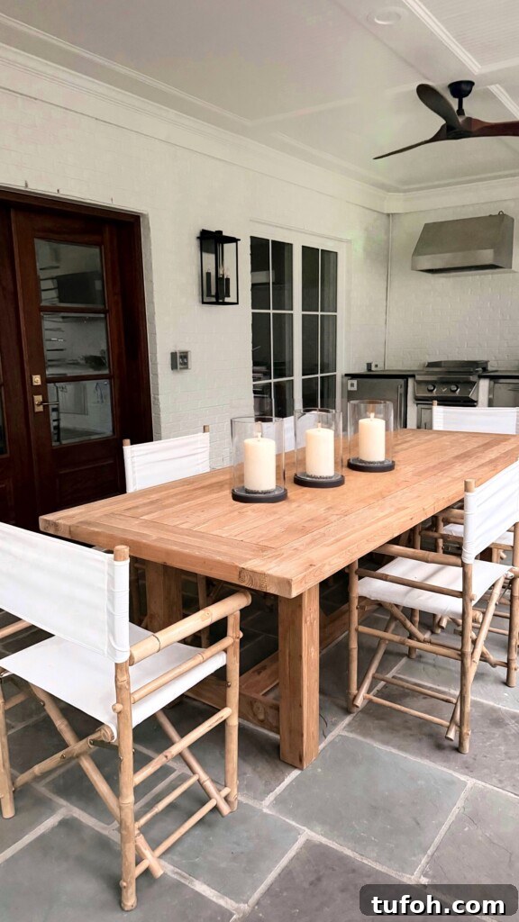 10 Clear Signs Spring Has Arrived and What They Mean 3 Bamboo folding director chairs and teak dining table on covered patio with outdoor kitchen