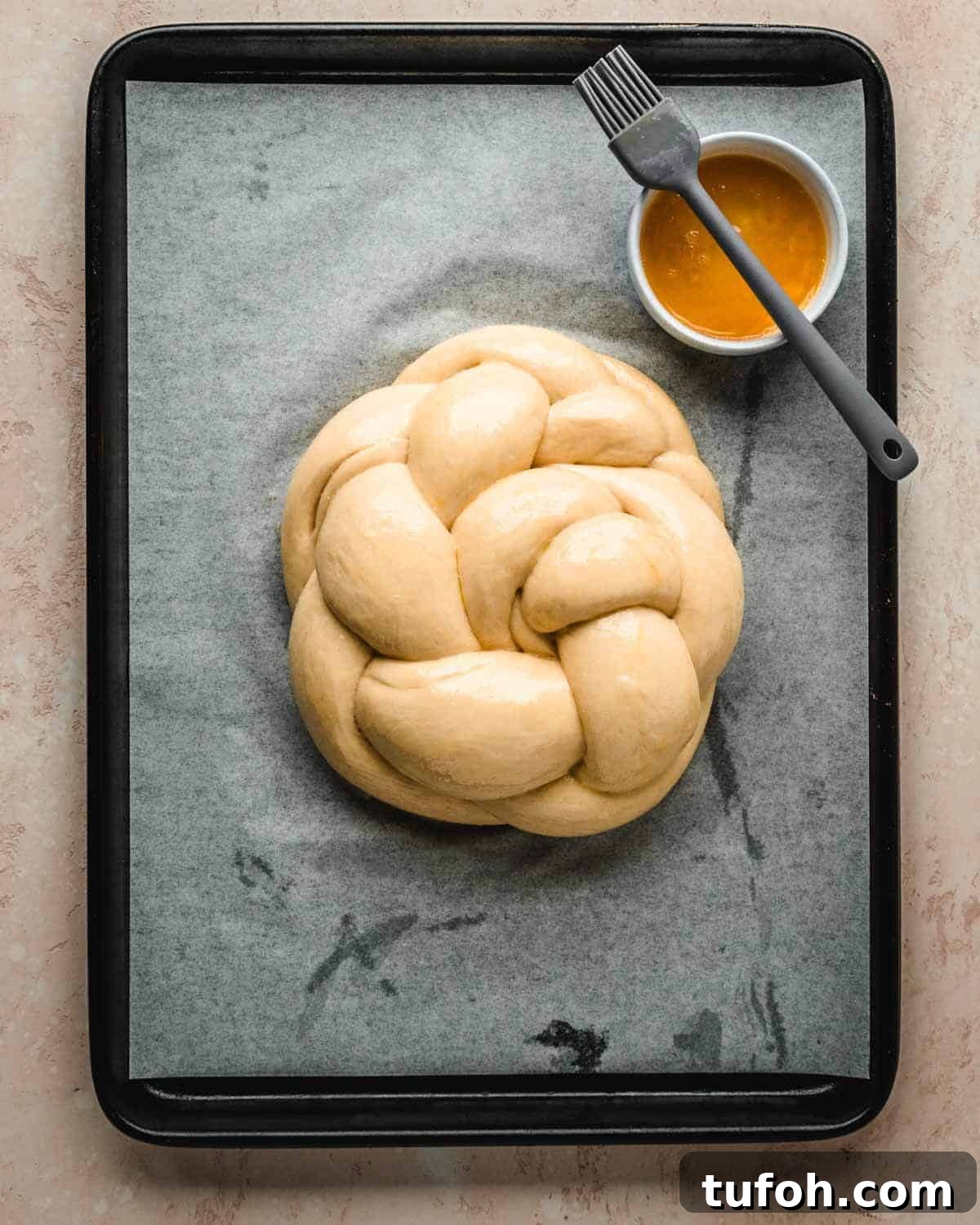 Sourdough Challah Recipe: Step-by-Step Guide for Perfect Braids 14 Brush challah dough with egg wash to give it s shiny, golden crust.