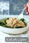 Salmon Salad in a bowl with a fork