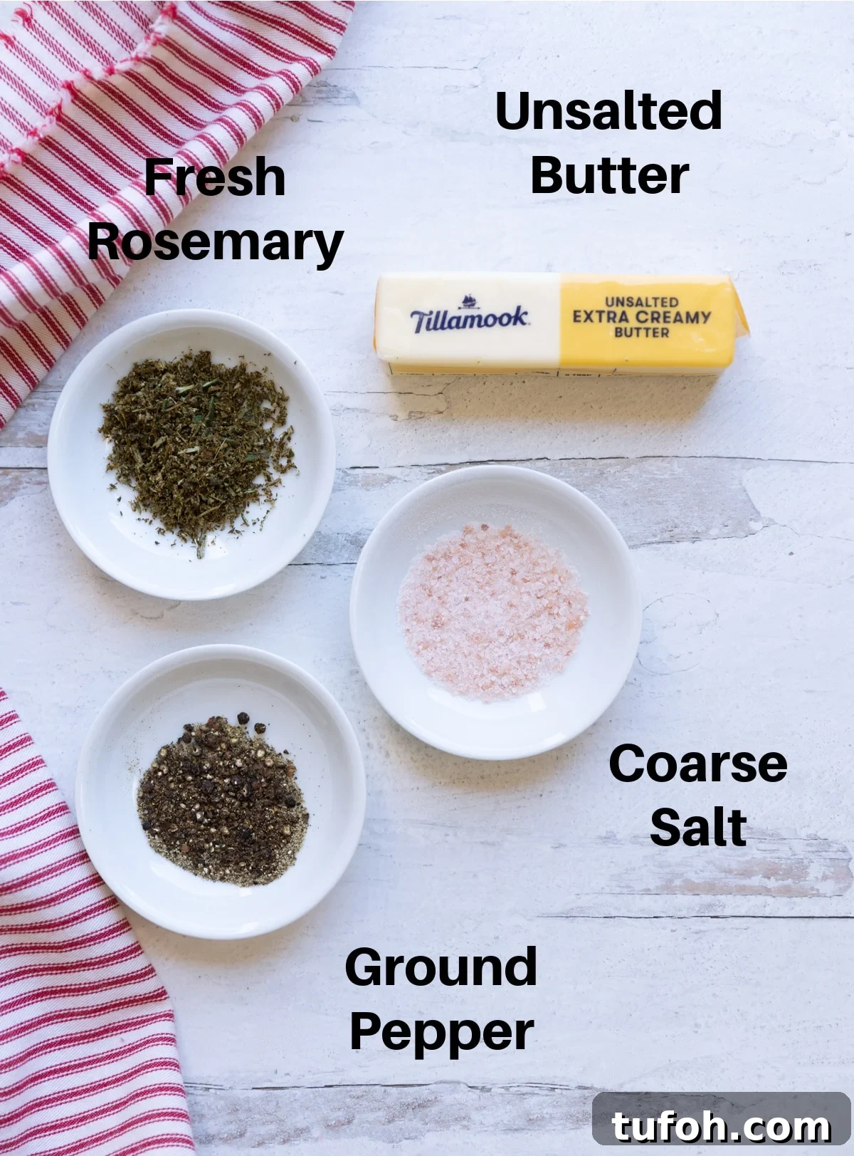 Rosemary Compound Butter for Steak, Chicken, Vegetables and More 4 fresh rosemary, butter, salt, and pepper on a counter.