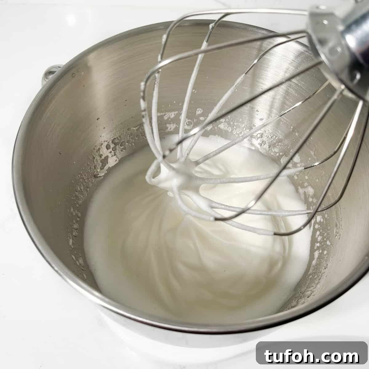 Hertzoggies: South African Jam and Coconut Tartlets Recipe 12 Egg whites whipped to stiff peaks.