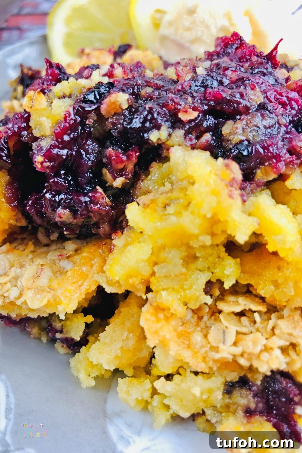Zoomed in image of blackberry dump cobbler with lemon