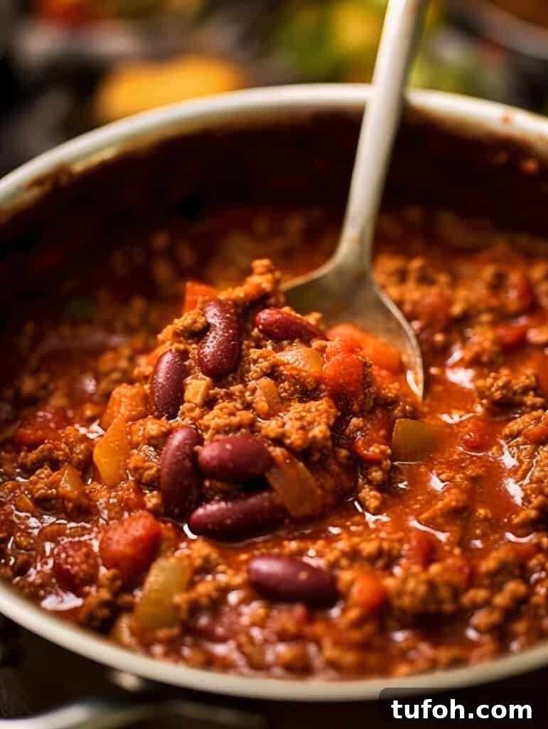 Serving of turkey chili with cornbread