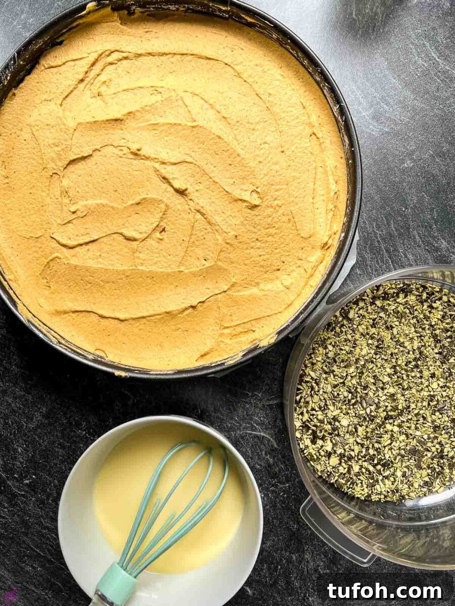 No-Bake Pumpkin Cheesecake Recipe — Creamy Fall Dessert 9 Pumpkin cheesecake prior glazing.