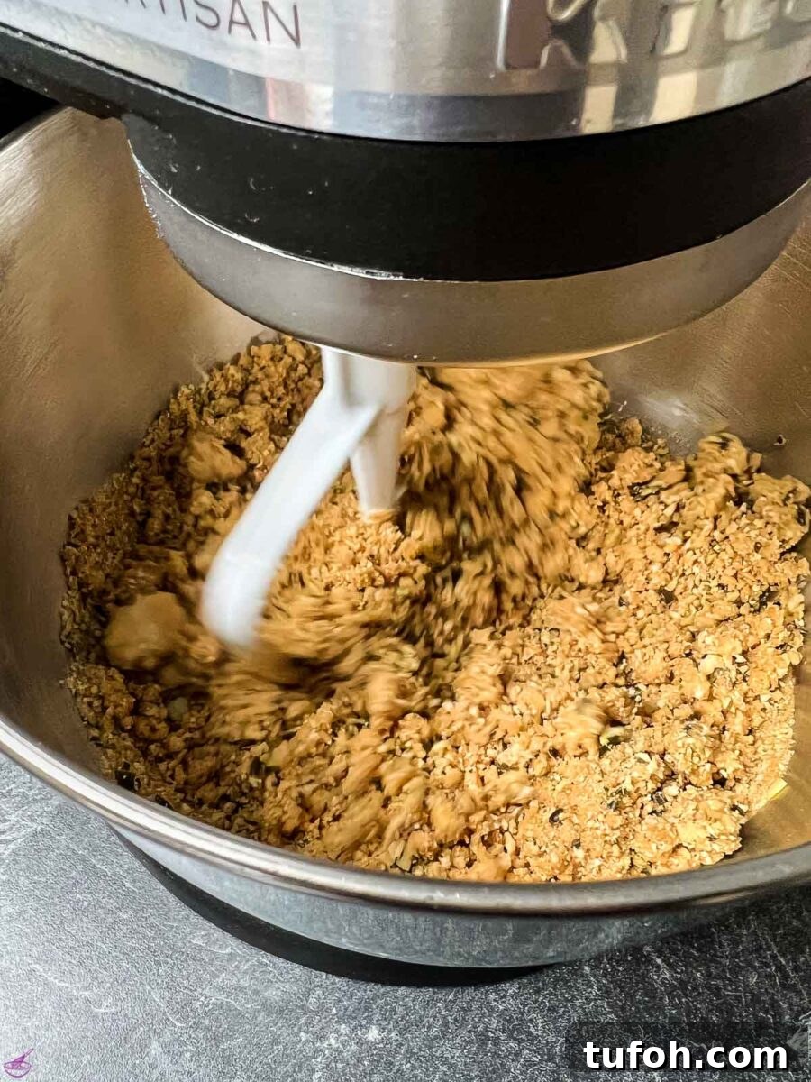 No-Bake Pumpkin Cheesecake Recipe — Creamy Fall Dessert 6 Combine grahem cracker crumbs with pumpkin seeds and butter.