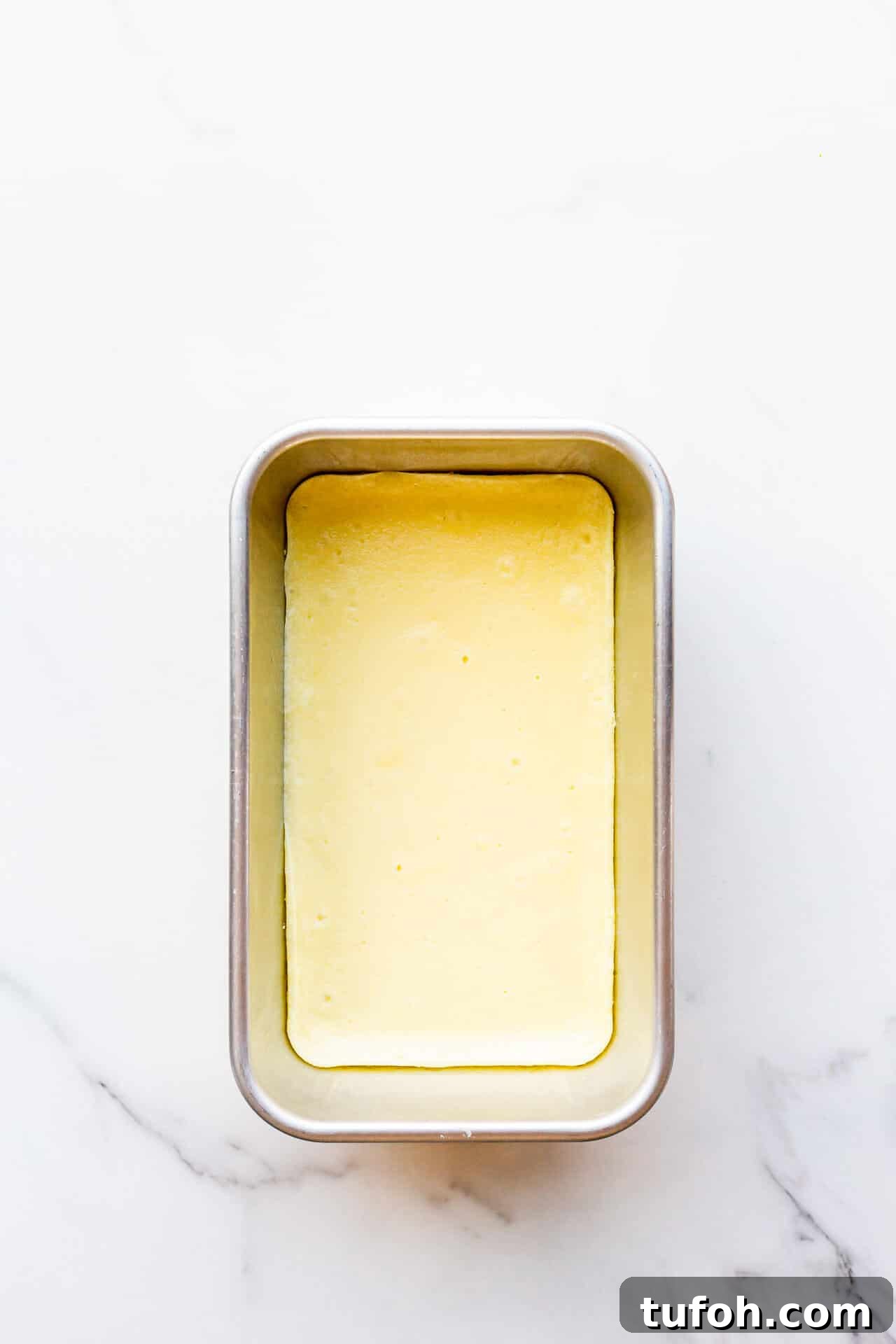 Zesty Orange Pie Recipe: Moist Citrus Tart with Fresh Orange Zest 6 Liquid cheesecake filling baked in a metal loaf pan to set it so that it's thick enough to fill pies and cakes.