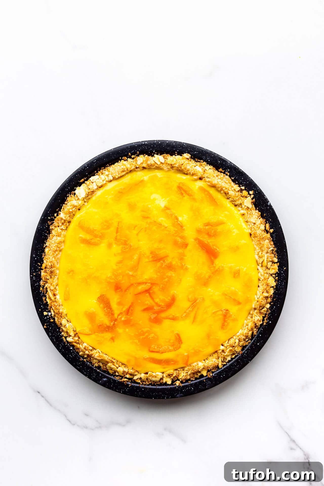 Zesty Orange Pie Recipe: Moist Citrus Tart with Fresh Orange Zest 8 Orange pie glazed with orange marmalade.